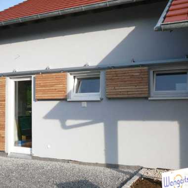 07.1-Schiebeläden-mit-Holzbeplankung