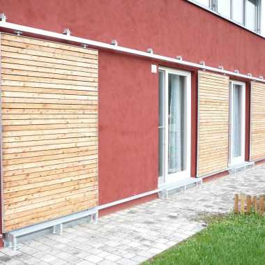 07.2-Schiebeläden-mit-Holzbeplankung